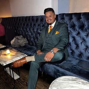 Green stripped three piece suit